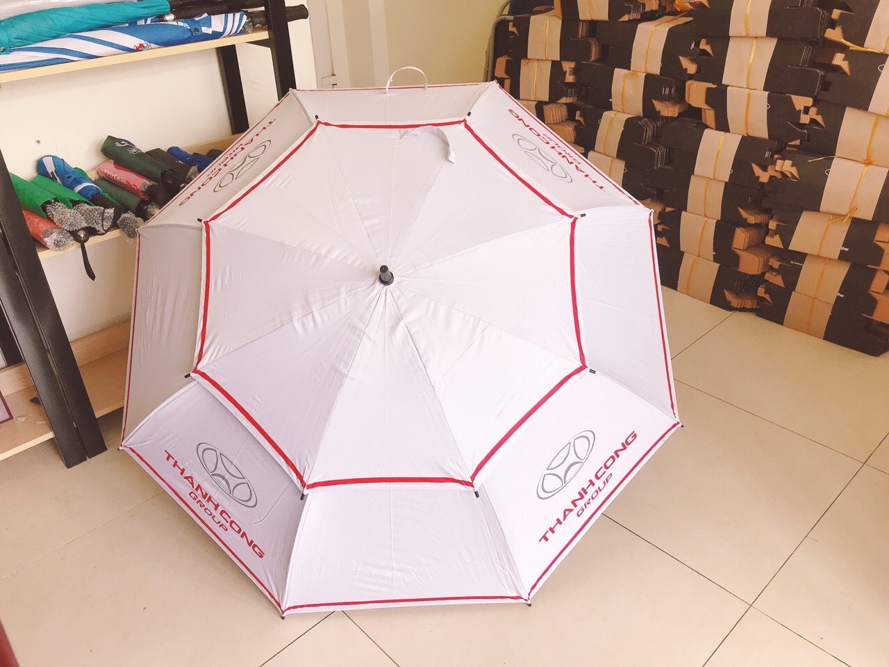 Quà tặng ô dù cầm tay in logo